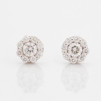 Brilliant-cut diamond earrings.