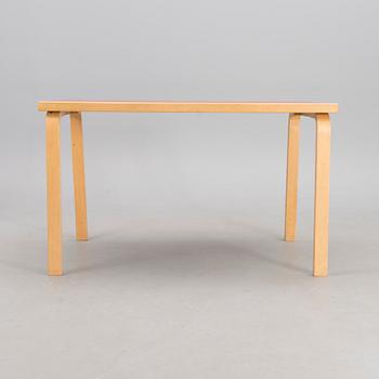 Table with a red linoleum top, Artek, 1960s-1970s.