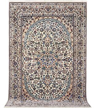 A Nain carpet, part silk, 9 laa, c. 318 x 209 cm.