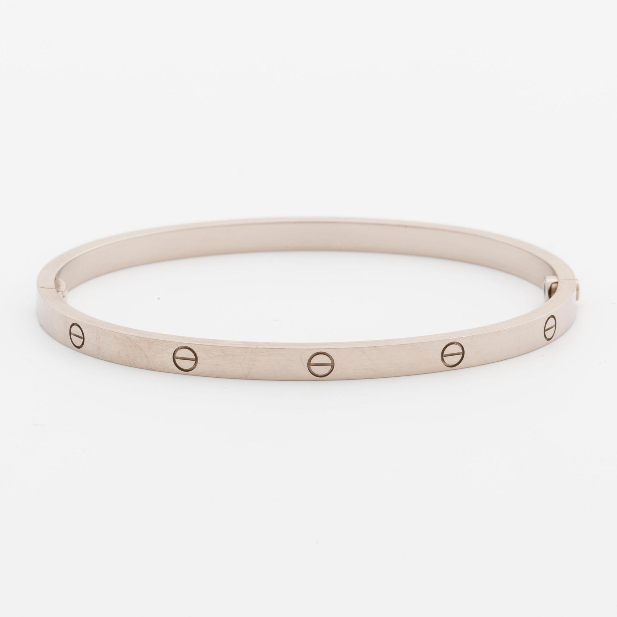 ARMRING, Cartier "Love bracelet" med tillhörande skruvmejsel. 18K vitguld.