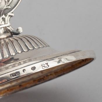A Swedish 19th century matched set of four silver candlesticks, mark of Johan Petter Grönvall, Stockholm 1824.