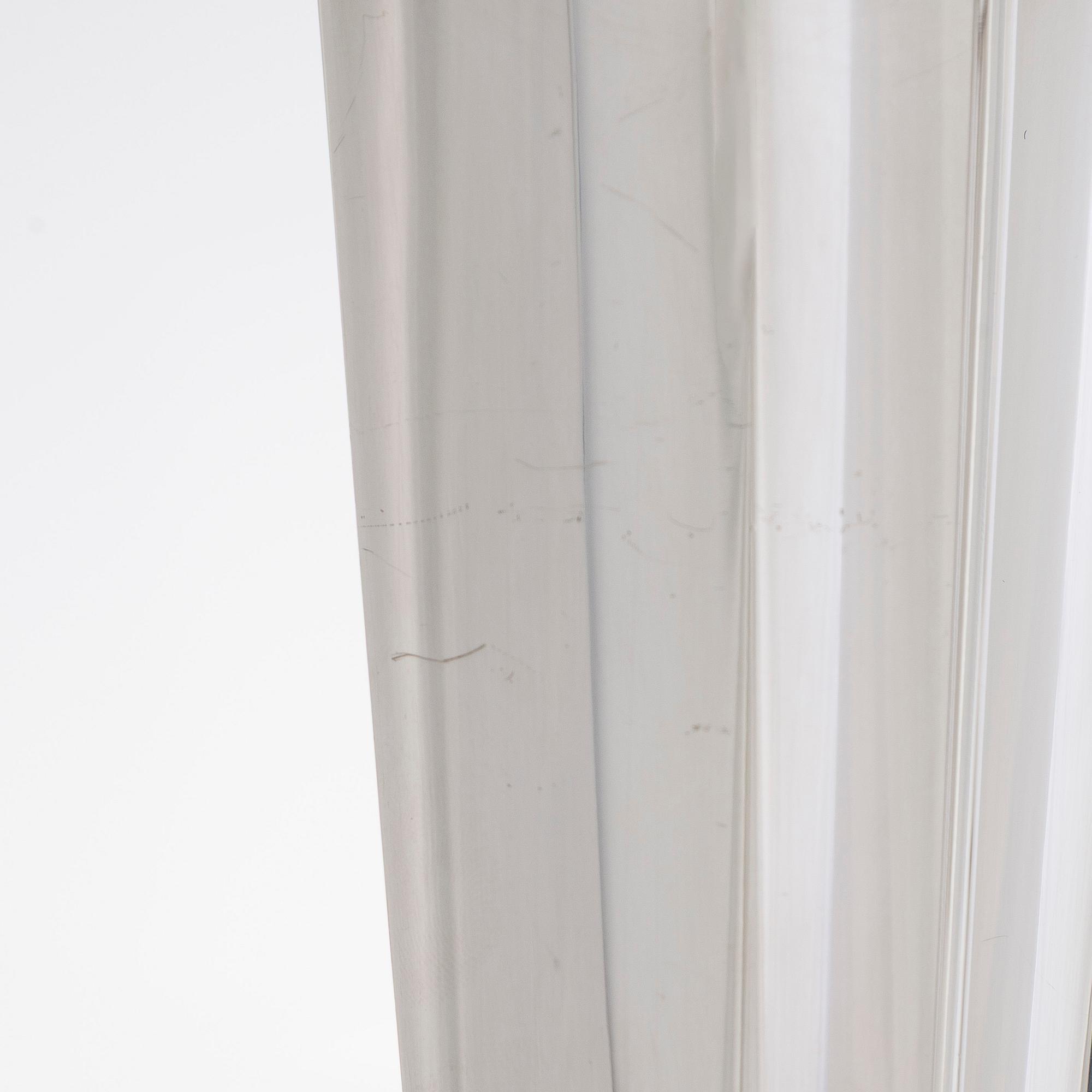 Tapio Wirkkala, two silver and teak 'Flame' vases, Kultakeskus, Hämeenlinna 1962 and 1964.