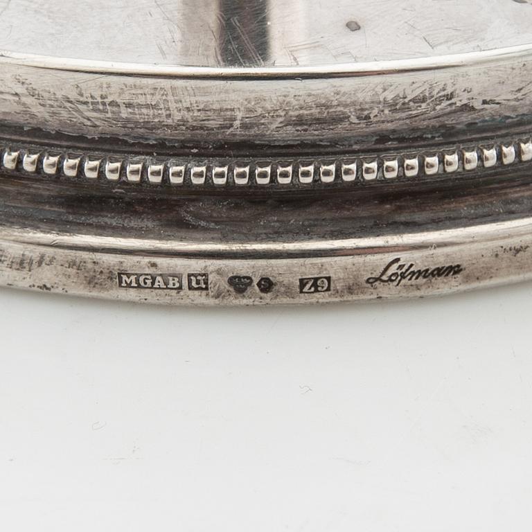 Eric Löfman, candlesticks, a pair, silver, MGAB, Uppsala, 1974.