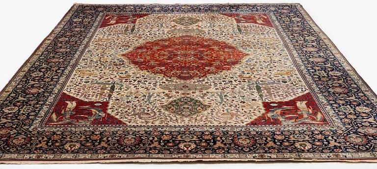 A semi-antique Benlian Tabriz carpet of 'Coronation' design, signed Jabarzade, c. 488 x 367 cm.