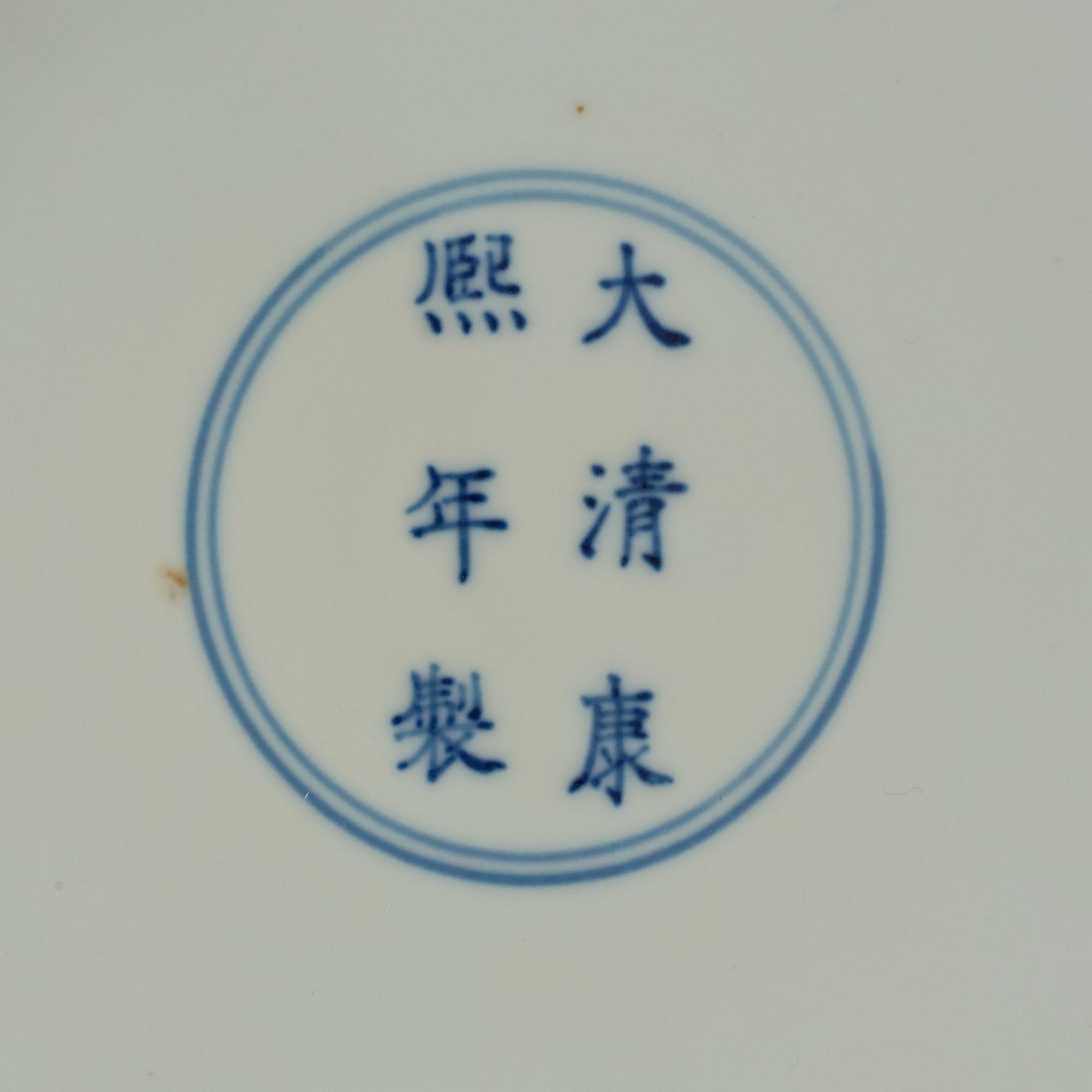 A large green enamelled blue and white dragon dish, probably late Qing dynasty with Kangxi's six character mark.