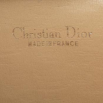 Christian Dior, a monogram clutch.