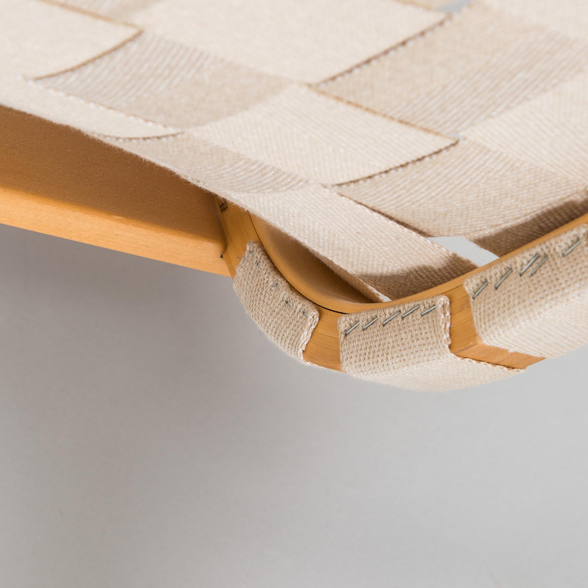 Alvar Aalto, a pair of late 20th century armchair model 406 Artek.