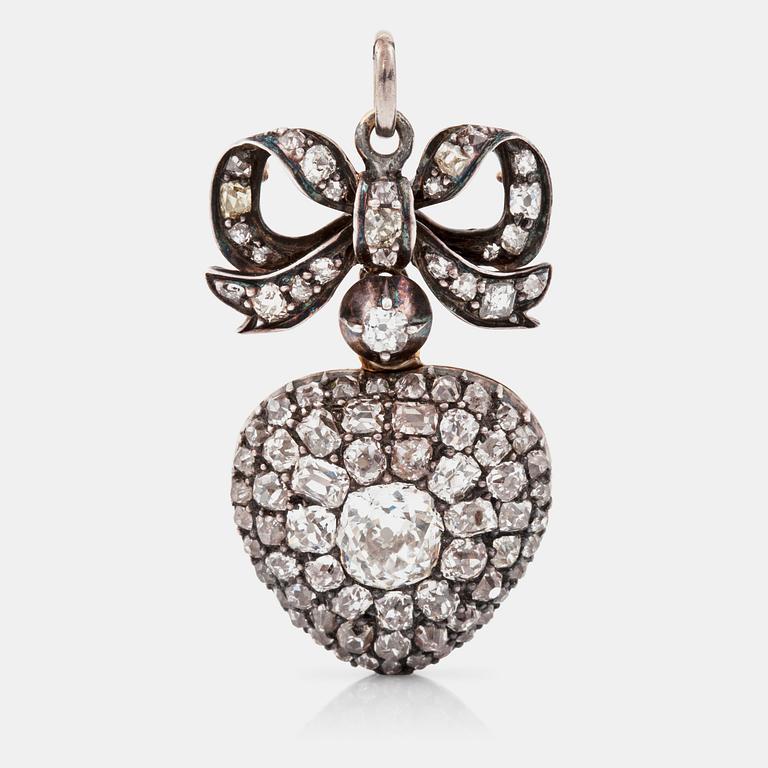 A Victorian pendant locket covered with old-cut diamonds. Center stone circa 1.00 ct.