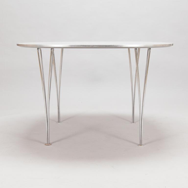 A "Superellips" dining table by Bruno Mathsson & Piet Hein for Fritz Hansen, Denmark, 1997.