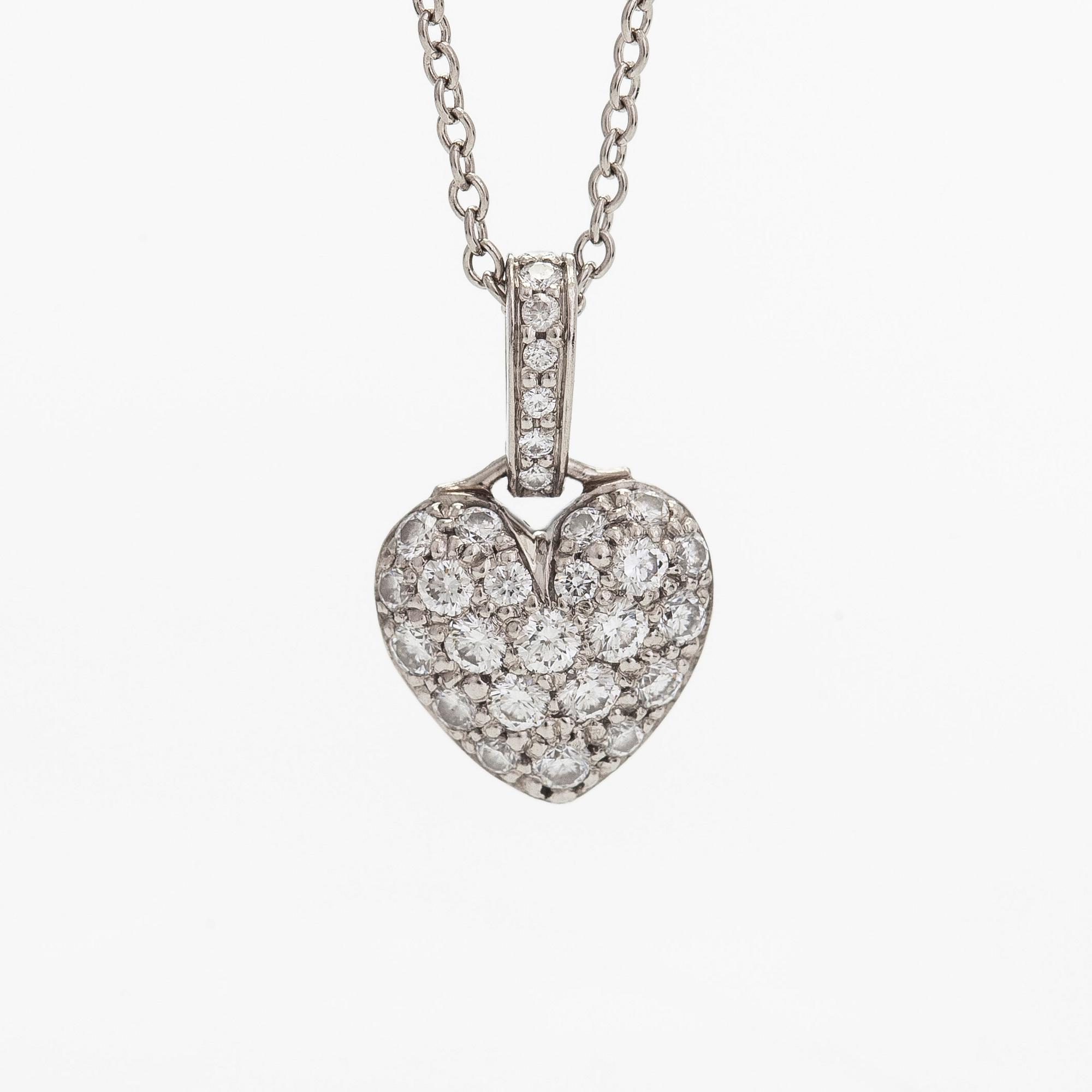 Tiffany & Co, a platinum necklace with a pendant in the shape of a heart, with diamonds totalling approximately 0.27 ct.