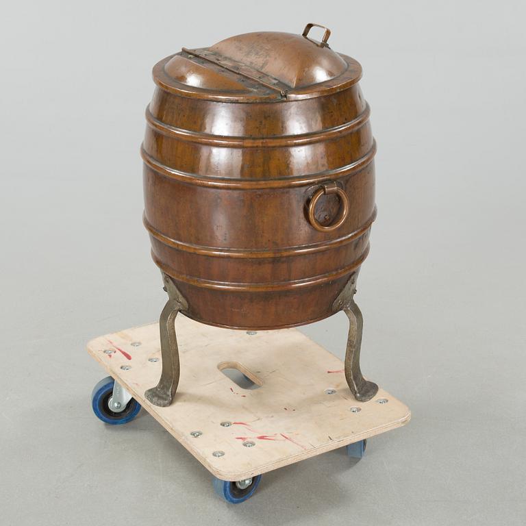 A copper water container, around the year 1900.