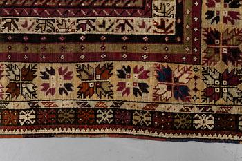 A carpet, antique Avanos, ca 190 x 136 cm (as well as 5 and 6 cm of flat weave on each end.).