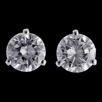 1012. A pair of brilliant cut diamond studs, 0.74 cts, resp. 0.74 cts.