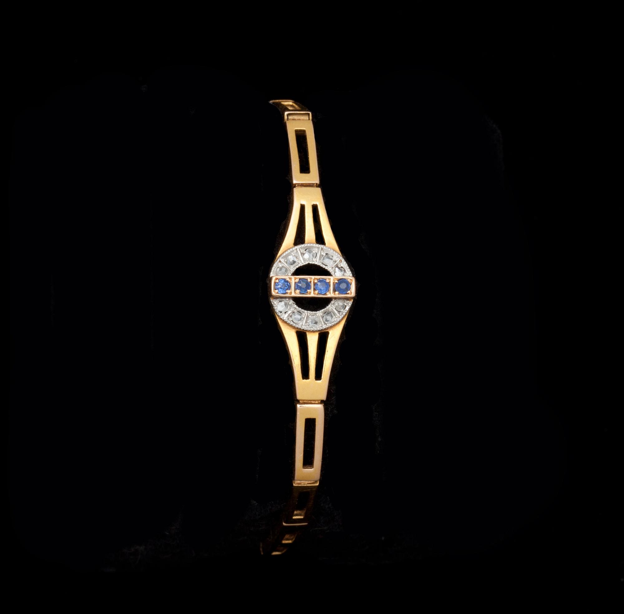 ARMBAND, 18k rödguld besatt med diamanter och safirer. Vikt 11 g.