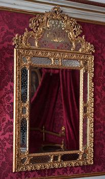 A Baroque late 17th century mirror with the arms of Count Wrede, attributed to Burchard Precht.