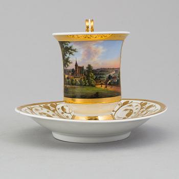 A CUP AND SAUCER, porcelain, KPM, Königliche Porzellan-Manufaktur Berlin, early 19th century.