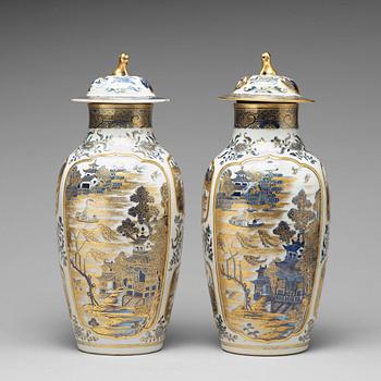 943. A pair of blue and white vases with covers, Qing dynasty, Qianlong (1736-95).