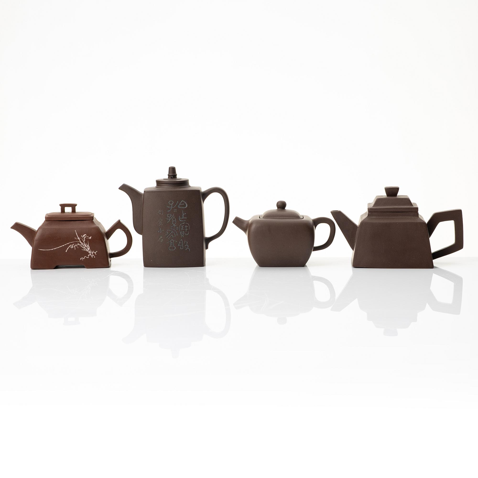 A group of four square yixing teapots, China, 1970/80s.