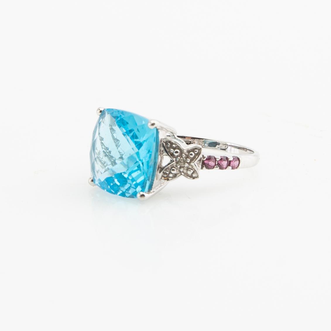 Ring, 14K gold with topaz, diamonds, and purple garnets.