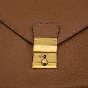 SALVATORE FERRAGAMO, a leather briefcase, calendar and phonebook.