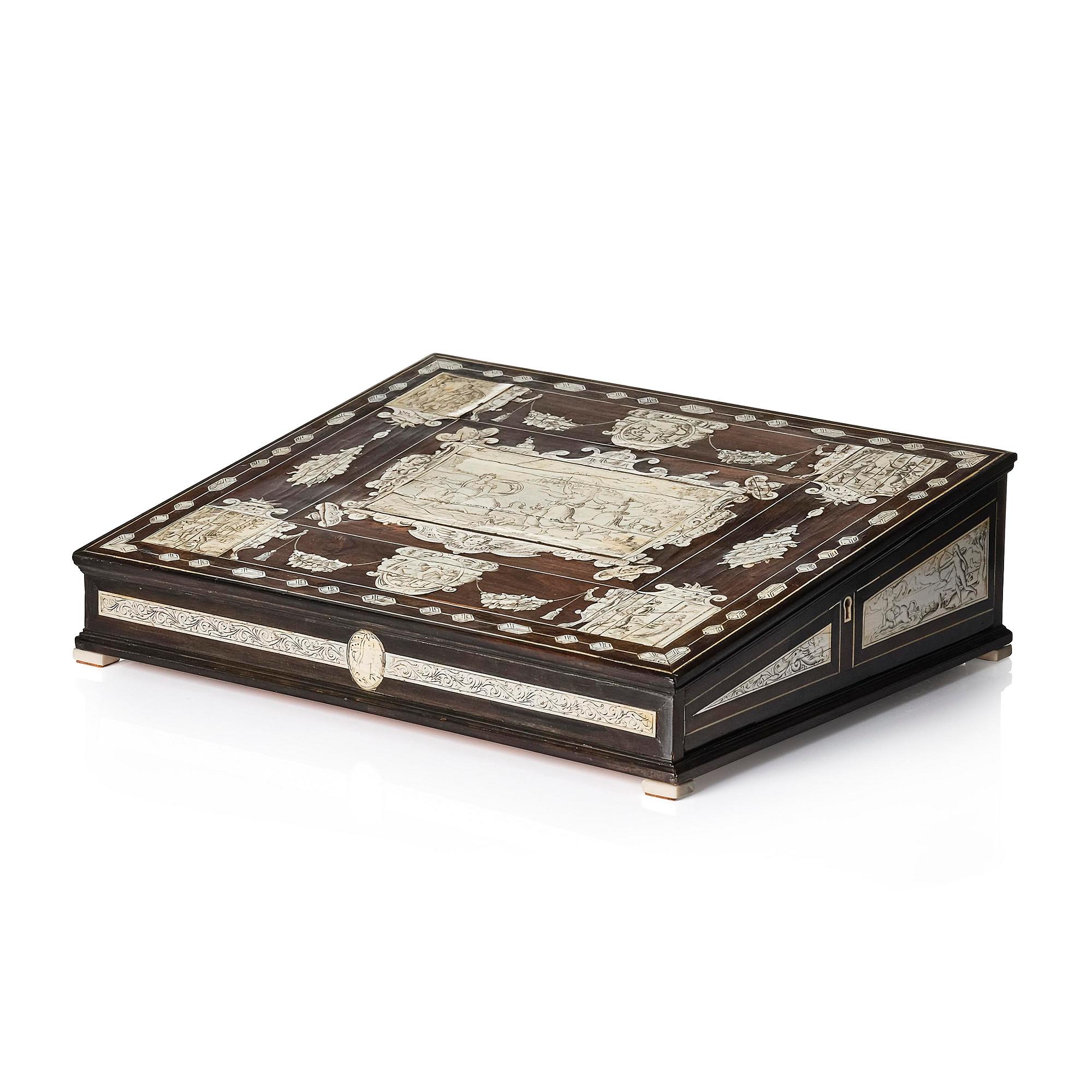 A Neopolitan ebony, rosewood and engraved ivory writing box from the circle of Iacopo Fiamengo, first part 17th century.