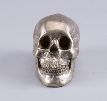 KRANIUM, vitmetall sent 1900-tal.