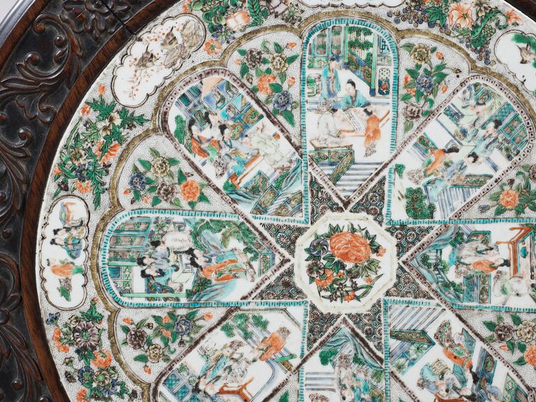 A hardwood and porcelain plaquette in famille verte  table, Qing dynasty 19th century.