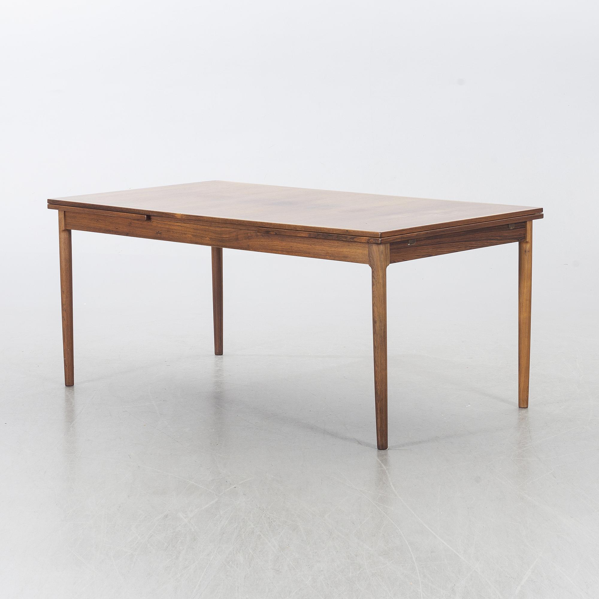 A Table from Slagelse Möbelvaerk A/S and 4 chairs, Niels Otto Møller, JL Møller. Denmark, 1960's.