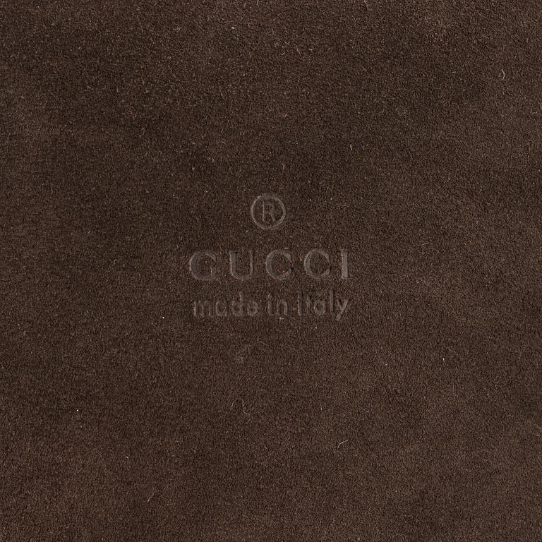Gucci, a Bamboo suede bag.