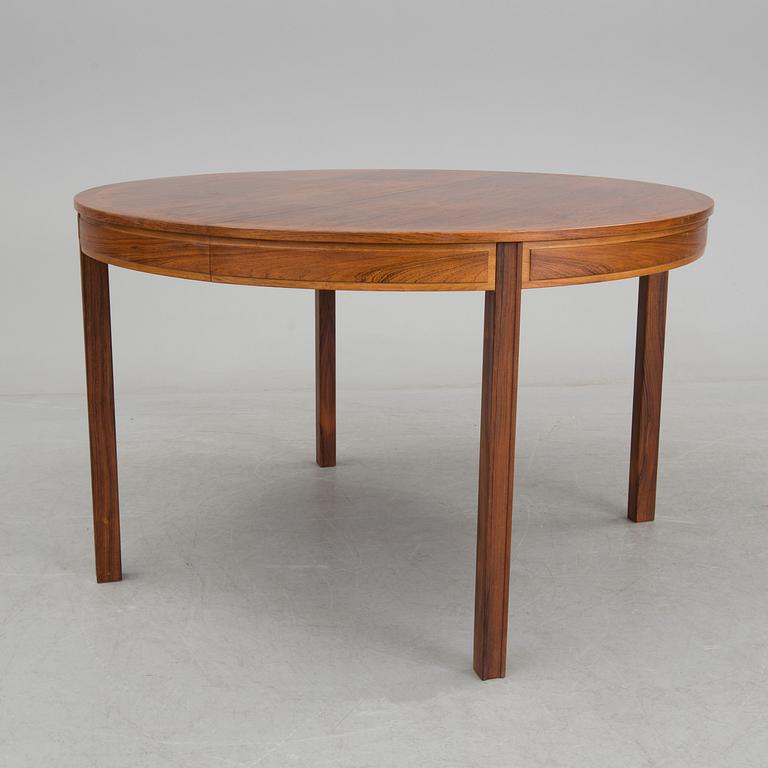 A rosewood dining table by Bertil Fridhagen for Bodafors.