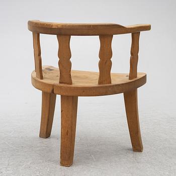 A folk art chair, circa 1900.