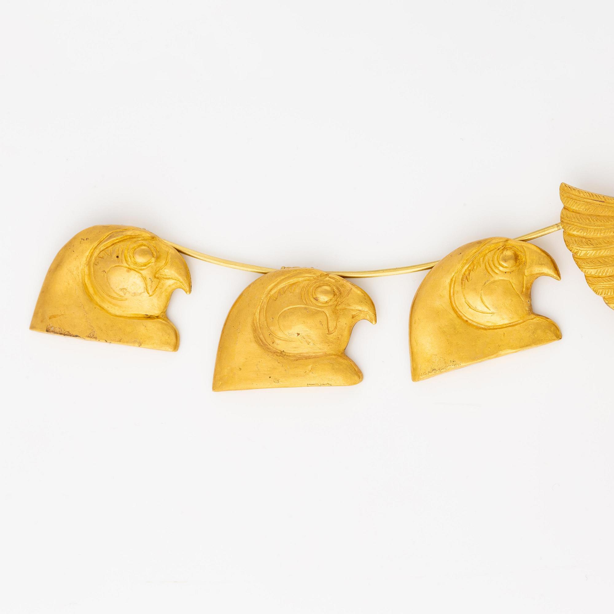 A modern Egyptian-style gold necklace.