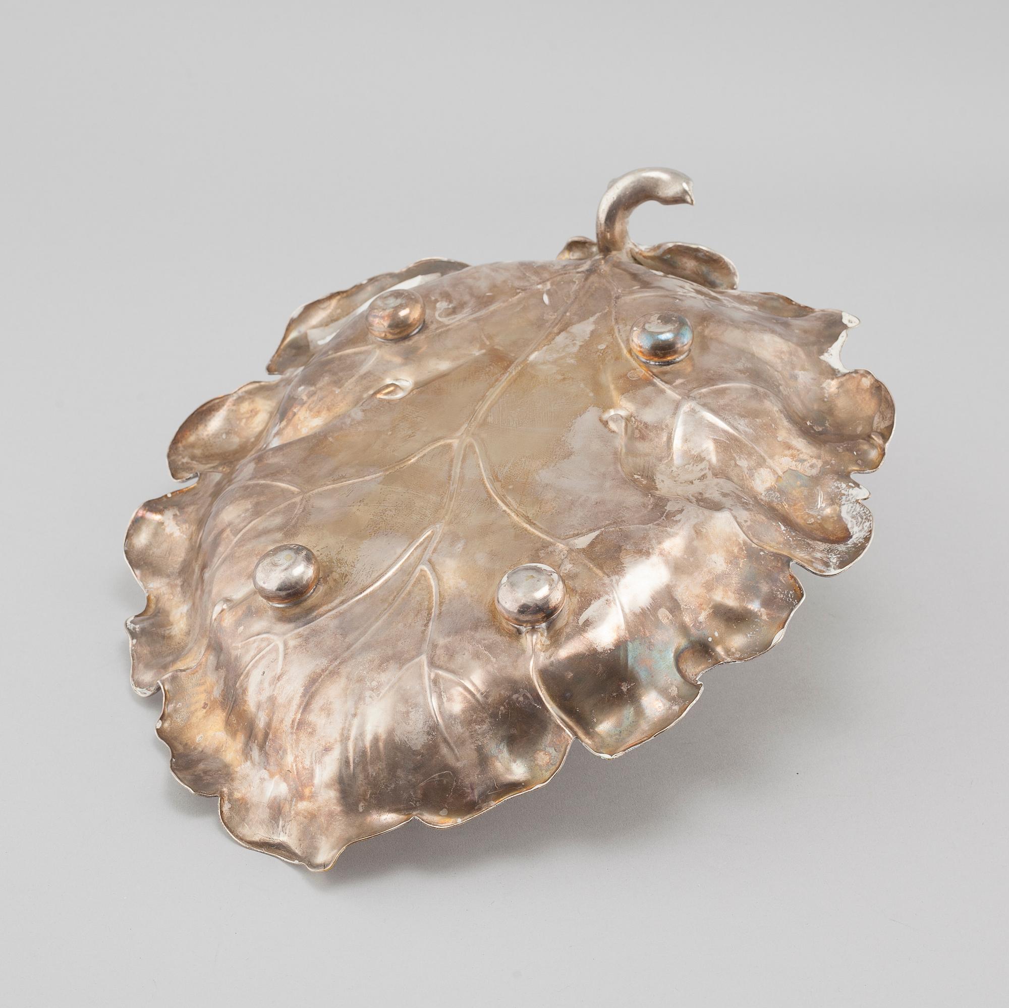 A silvered metal serving dish, early 20th century.