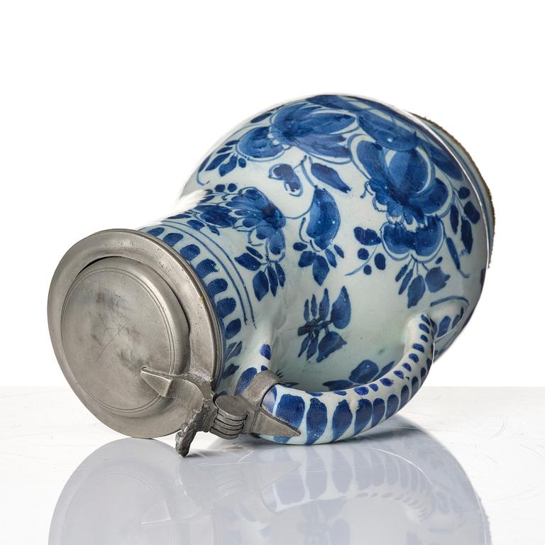 A blue and white Dutch faiance tankard with pewter mountings, Delft, 18th century.