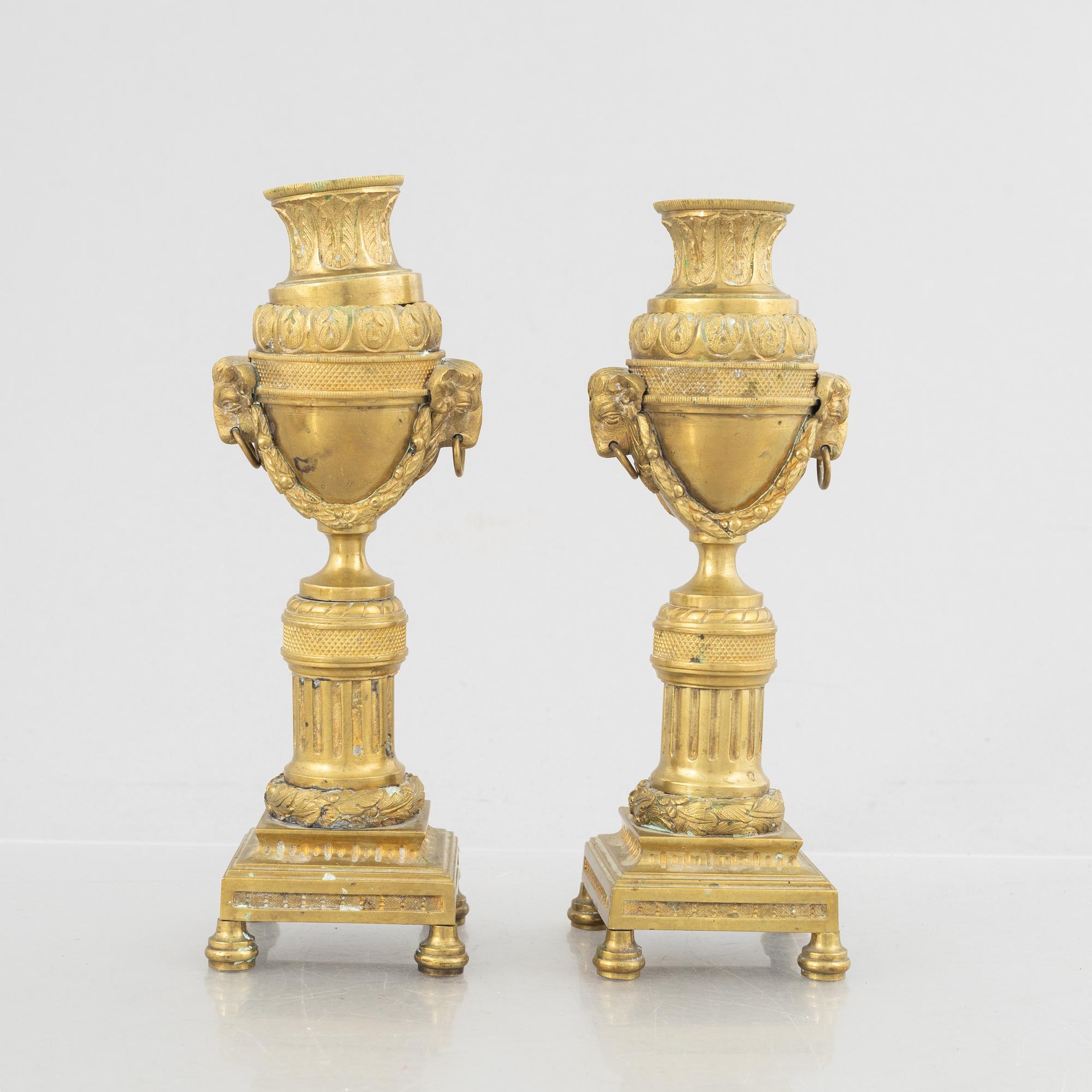 A pair of Louis XVI-style candlesticks, late 19th century.