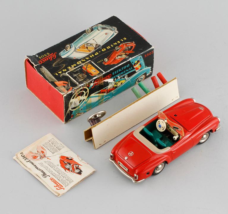 A Schuco toy car.