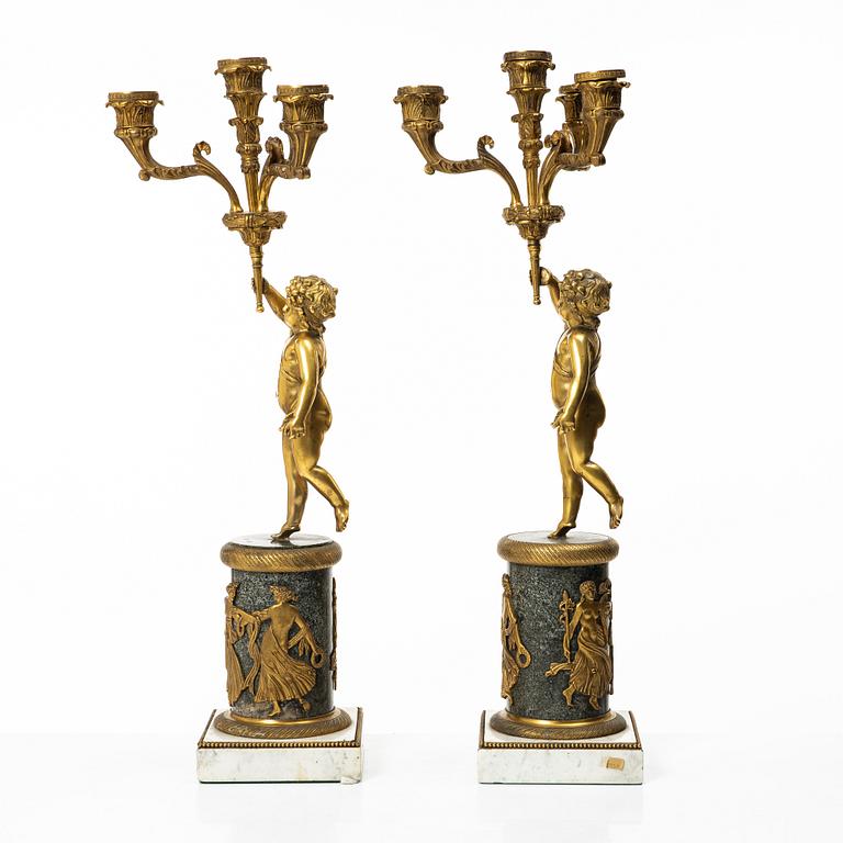 A pair of Empire style candelabra, circa 1900.