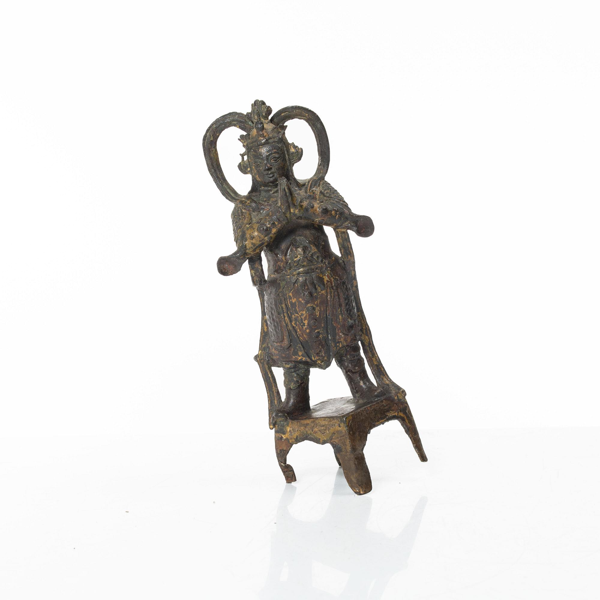 A Chinese bronze figure of a guardsman, Ming dynasty (1368-1644).