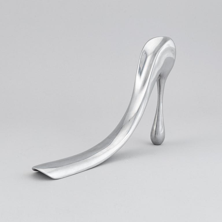A metal shoe horn by Manolo Blahnik, 2000s.