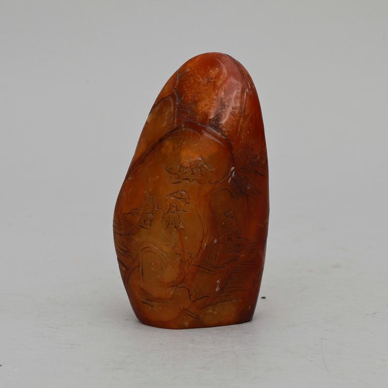 SKULPTUR, bärnsten. Kina 1800/1900-tal.