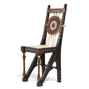 162. Carlo Bugatti, CARLO BUGATTI, an ebonized wood and walnut chair, Turin, Italy ca 1900.