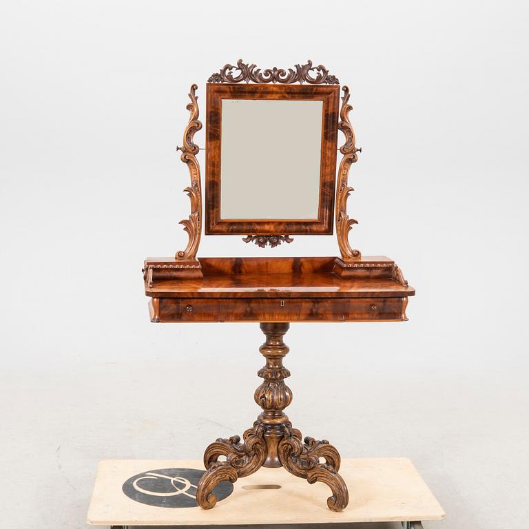 A neo Rococo mahogany vanity desk.