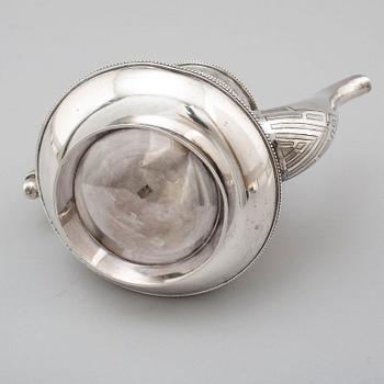 A Russian 19th century parcel-gilt silver tea pot and cream jug, mark possbly of Alexander Lokin, St. Petersburg 1893.