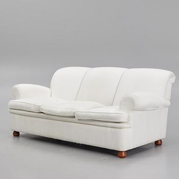 Josef Frank, a model 703 sofa, Firma Svenskt Tenn.