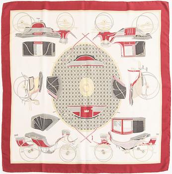 Hermès, a 'Les Voitures à Transformation' silk scarf.