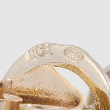 Earrings, a pair, 18K gold with brilliant-cut diamonds.