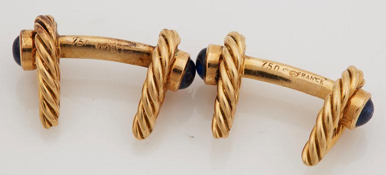 MANSCHETTKNAPPAR, med cabochonslipade safirer.
