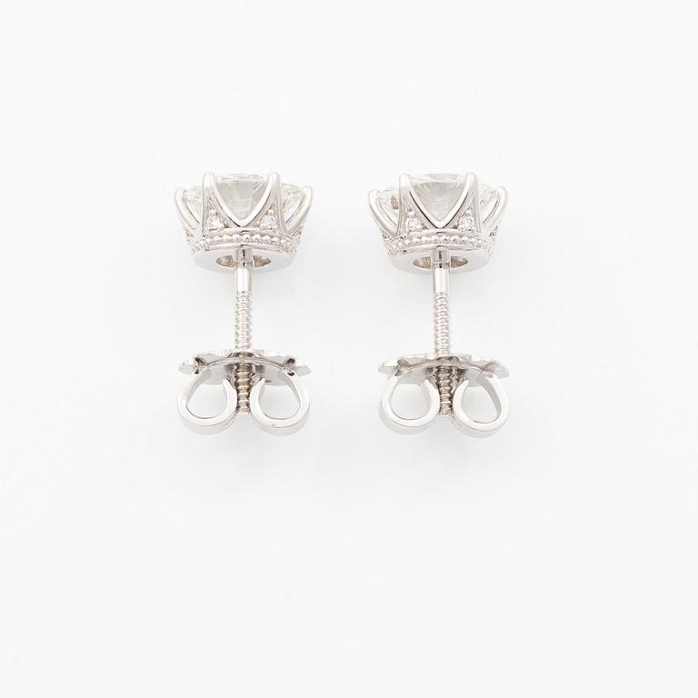 Earrings, single-stone earrings in 18K white gold with brilliant-cut diamonds, accompanied by IGI report.