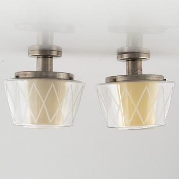 Harald Notini, a pair of model '11197' ceiling lamps, Arvid Böhlmarks Lampfabrik, Stockholm, 1940's/50's.