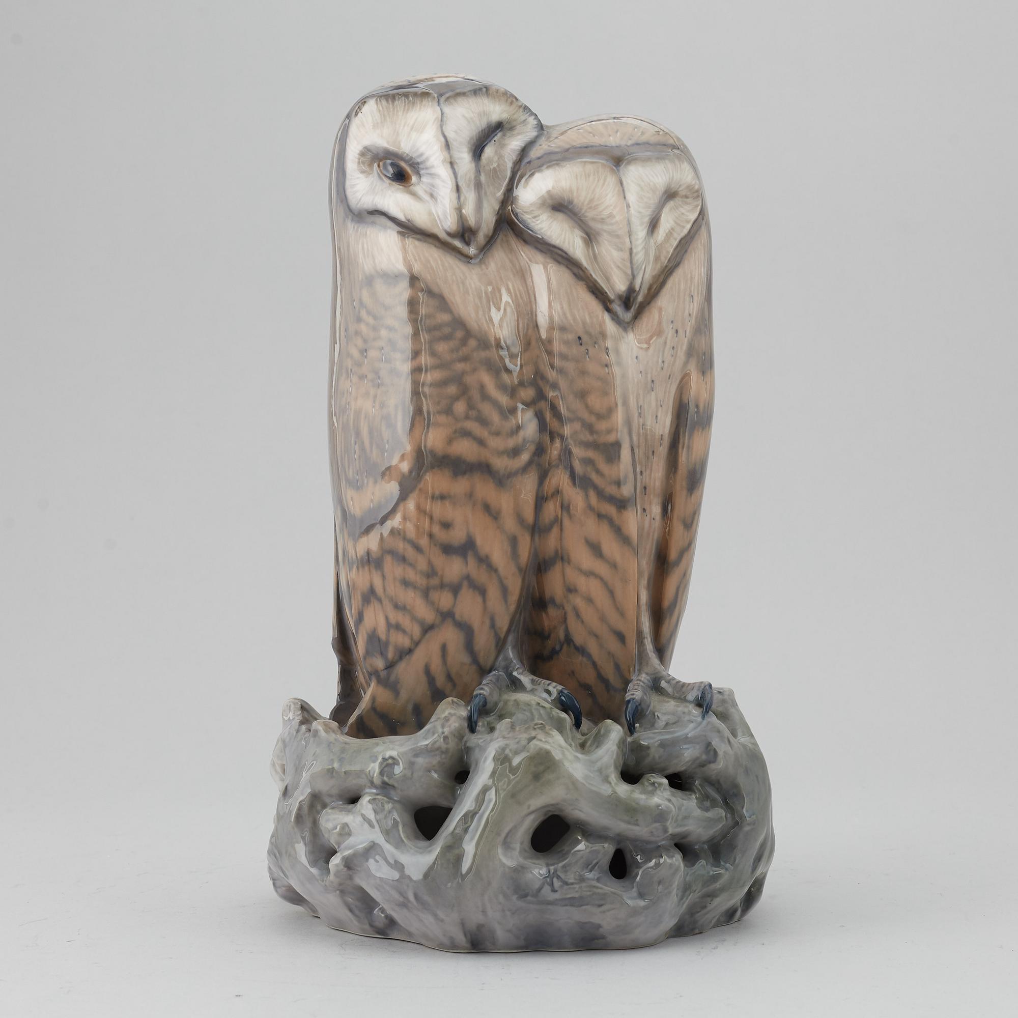 A Royal Copenhagen porcelain figure of two owls, Denmark, 20th Century.